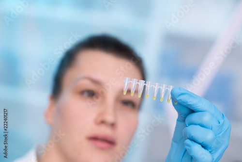 Young woman with genetic research in the laboratory research of cancer diseases
