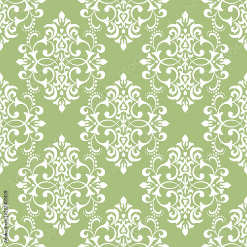 Wallpaper in the style of Baroque. Seamless vector background. White and green floral ornament. Graphic pattern for fabric, wallpaper, packaging. Ornate Damask flower ornament