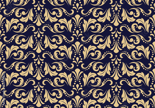 Wallpaper in the style of Baroque. Seamless vector background. Dark blue and gold floral ornament. Graphic pattern for fabric, wallpaper, packaging. Ornate Damask flower ornament