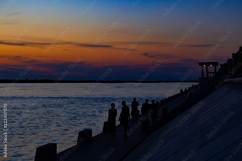 Sunset on the embankment of the Amur river in Khabarovsk. Russia.