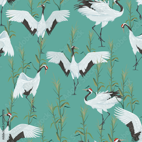 seamless pattern with cranes and reeds