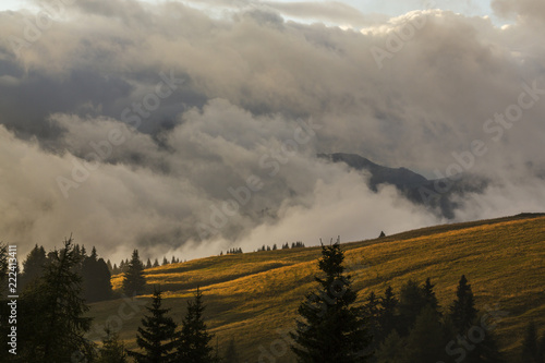 Dramatic clouds at sunset and beautiful light in the Dolomite Alps