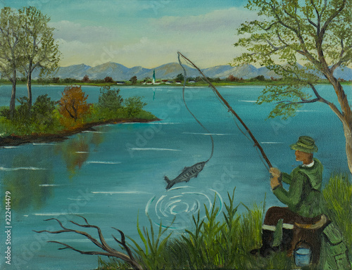 Mann sitzt beim angeln und fängt einen Fisch