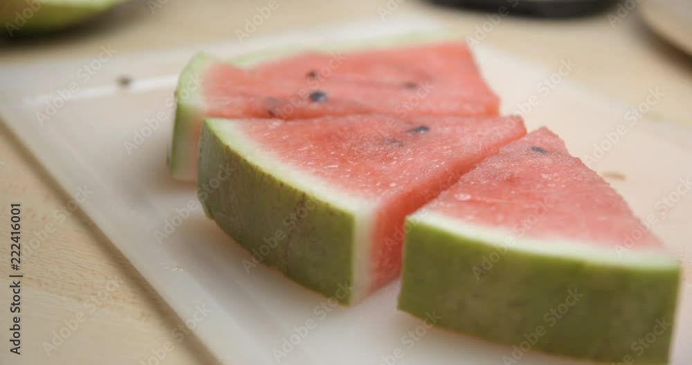 Watermelon slicing slowmotion, 4K DCI PRORES HQ Watermelon slicing slowmotion, 4K DCI PRORES HQ