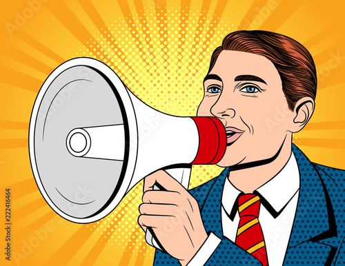 Vector colorful comics style illustration of a businessman with a mouthpiece in his hand. Portrait of a young handsome guy in a suit with a megaphone. The man makes an announcement to the loudspeaker