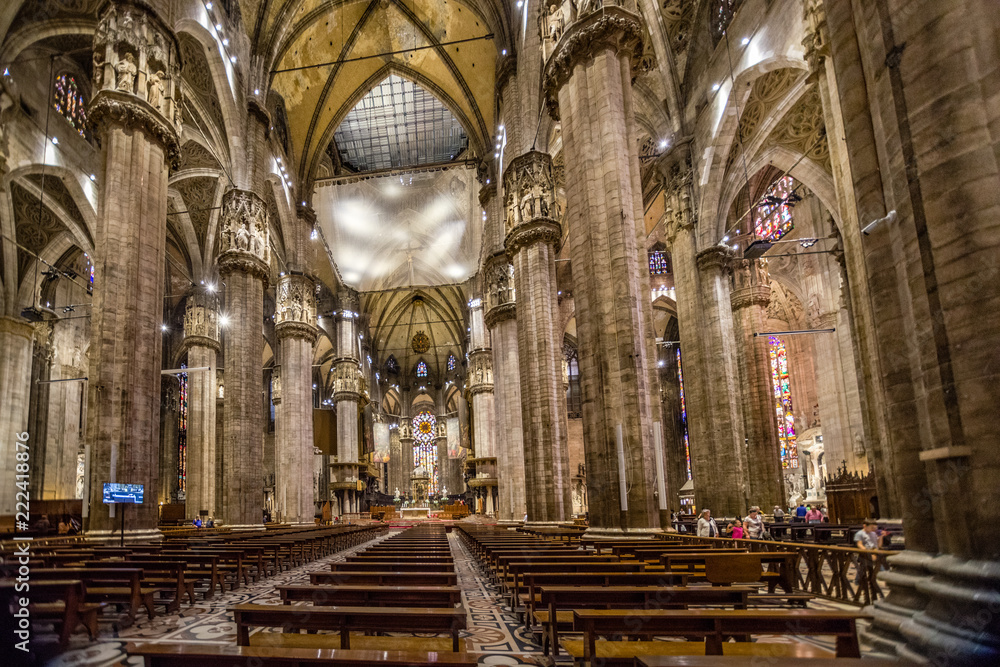 Columns, ceiling, vaults, stainglass windows, alters of interior of the Duomo di Milano