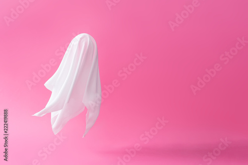 Obraz na plátně White ghost sheet costume against pastel pink background