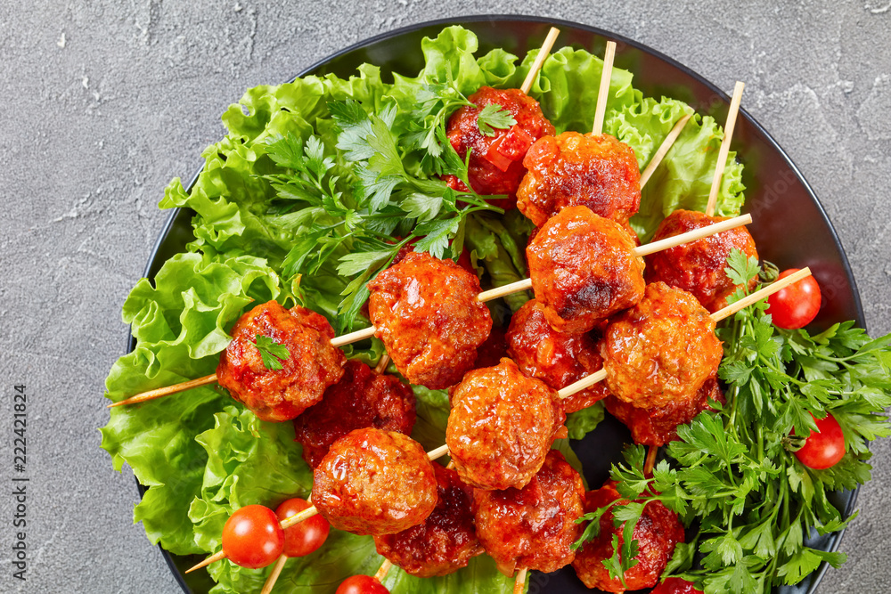 meatballs on skewers with fresh tomatoes