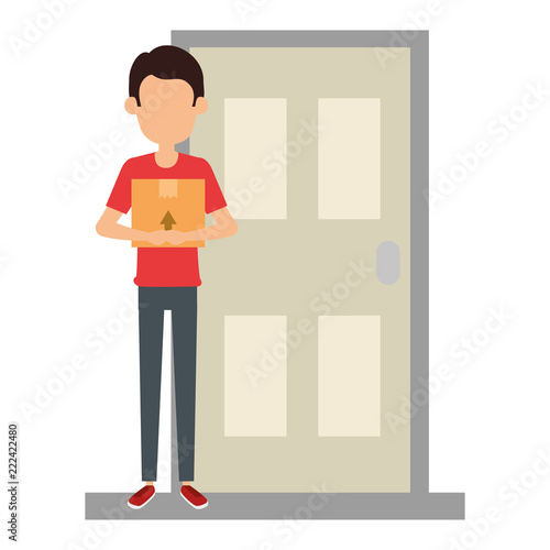 delivery worker lifting box in door