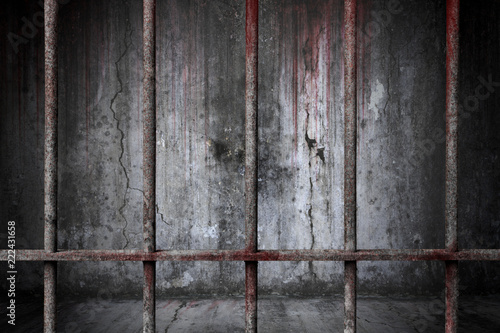 Fototapeta Old prison rusted metal bars cell lock with bloodstain and bloody background sca