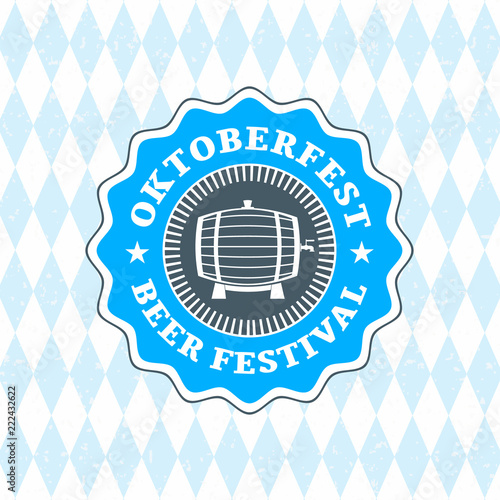 Beer festival Oktoberfest celebrations. Vintage beer badge on the traditional Bavarian linen flag background