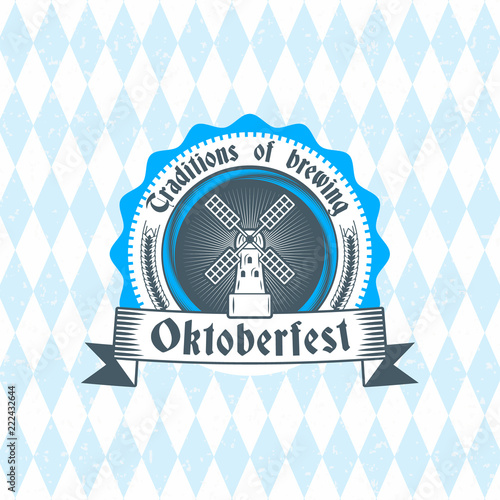 Beer festival Oktoberfest celebrations. Vintage beer badge on the traditional Bavarian linen flag background
