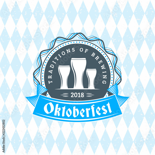 Beer festival Oktoberfest celebrations. Vintage beer badge on the traditional Bavarian linen flag background