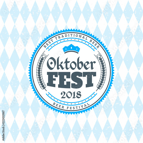 Beer festival Oktoberfest celebrations. Vintage beer badge on the traditional Bavarian linen flag background