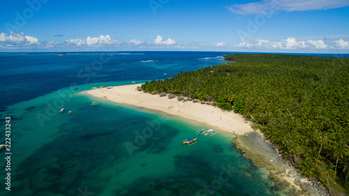 dako island pacific ocean palm trees sandy beach canoes surf drone aerial photography © Tim