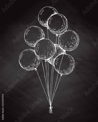 Group of balloons on a string. Hand drawn chalk on the board.