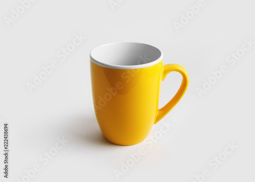 Blank yellow mug for coffee or tea. Cup mock-up.