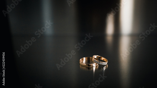 Tablou pe pânză wedding rings on a steel dark background