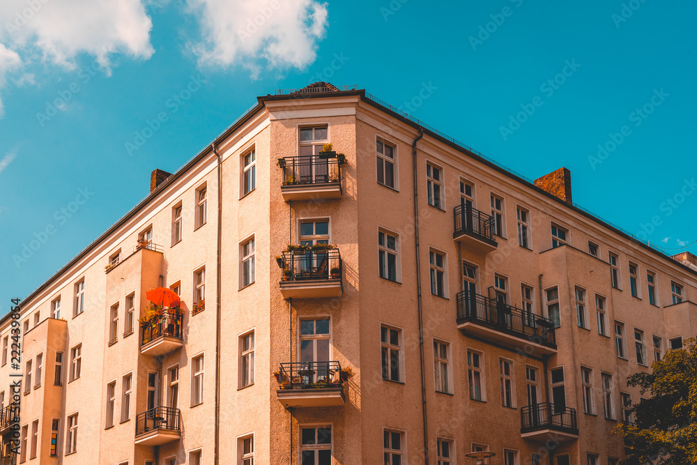 orange corner building in vintage colors
