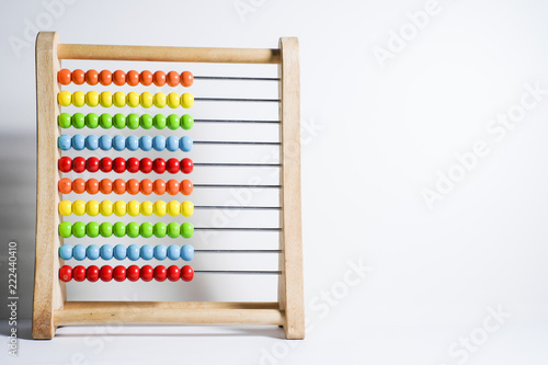 Abacus shows concept of traditional counting, calculation, mathematics, accounting, and finance.