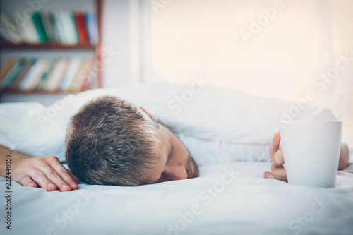 Man trying to wake up in the morning