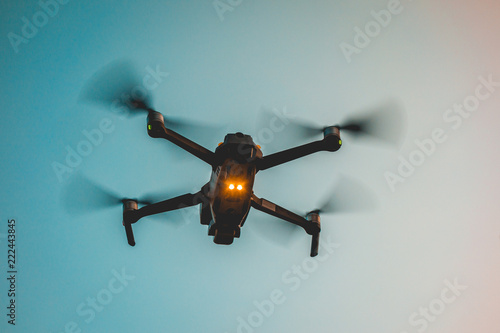 darken drone on blue warm background