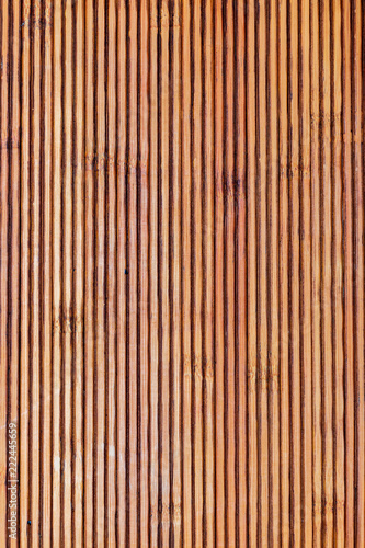 Fototapeta Naklejka Na Ścianę i Meble -  Rustic bamboo texture. Horizontal and vertical lines. Ocher and brown tones.