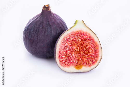 two fruits of figs on a white background