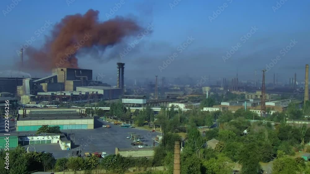 Polluting factory at dawn, time-lapse Polluting factory at dawn, time-lapse