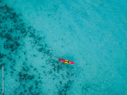 Kayaking on a crystal clear water in Koh Phi Phi, Thailand - Drone photography © naproadavida_npv