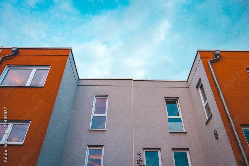 facade of modern white and red colored row houses at germany facade of modern white and red colored row houses at germany