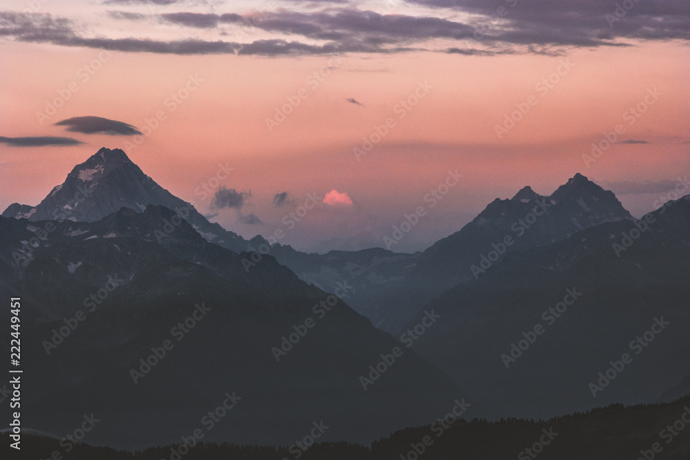 Sunset Mountains peaks and clouds Landscape Travel into the wild nature scenic aerial view .