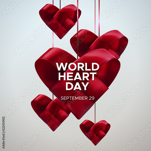 Realistic satin ribbon woven hanging hearts with World Heart Day label. Vector health care illustration. Medical awareness day concept