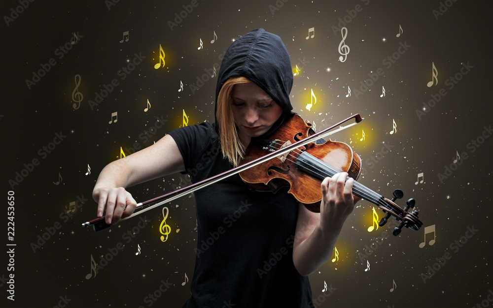 Fototapeta premium Young violinist with falling musical notes wallpaper and classical concept