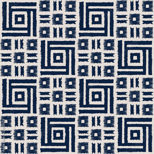 Abstract indigo shibori seamless vector pattern with ikat print of mosaic
