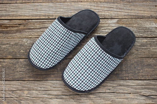 House slippers on wooden old floor