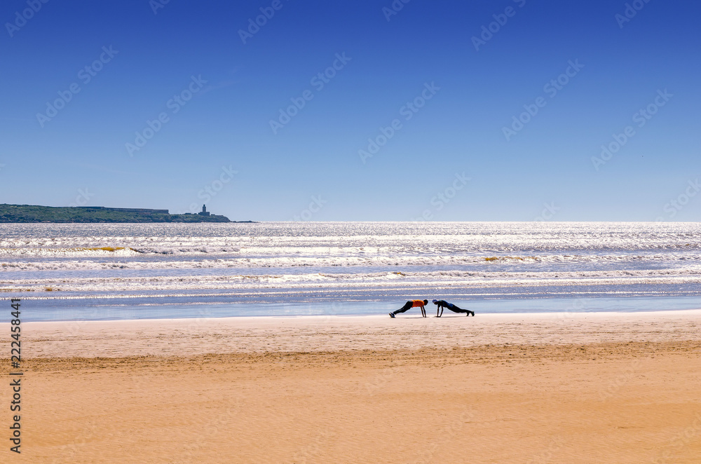 incredible Morocco, amazing Essaouira, a wonderful beach with people doing sports