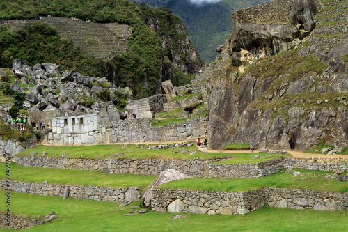 Temple of the Three Windows and the Agricultural Terraces in Distance, Machu Picchu Ancient Inca Ruins in Cusco Region, Peru 