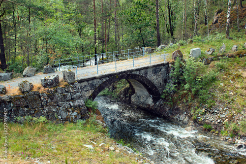 Small stone bridge over a rivulet in Skipavag  Norway