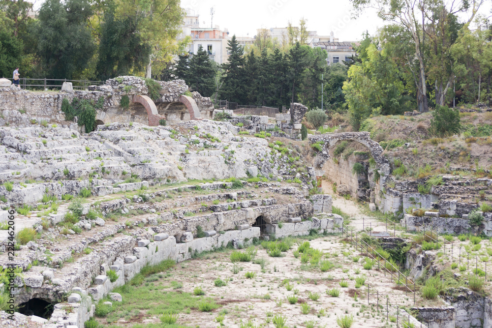 This is a detail of the ancient roman amphitheater of Syracuse in Sicily (Italy). It is located in the city archaeological park, a magnificent place full of history and culture