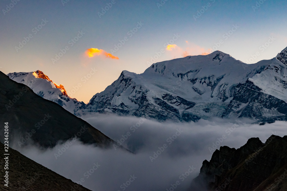 Scenic view of Annapurna mountains and clouds after sunset, Himalayas