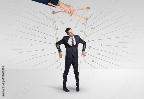 Marionette businessman with doodle lines and arrows around him 