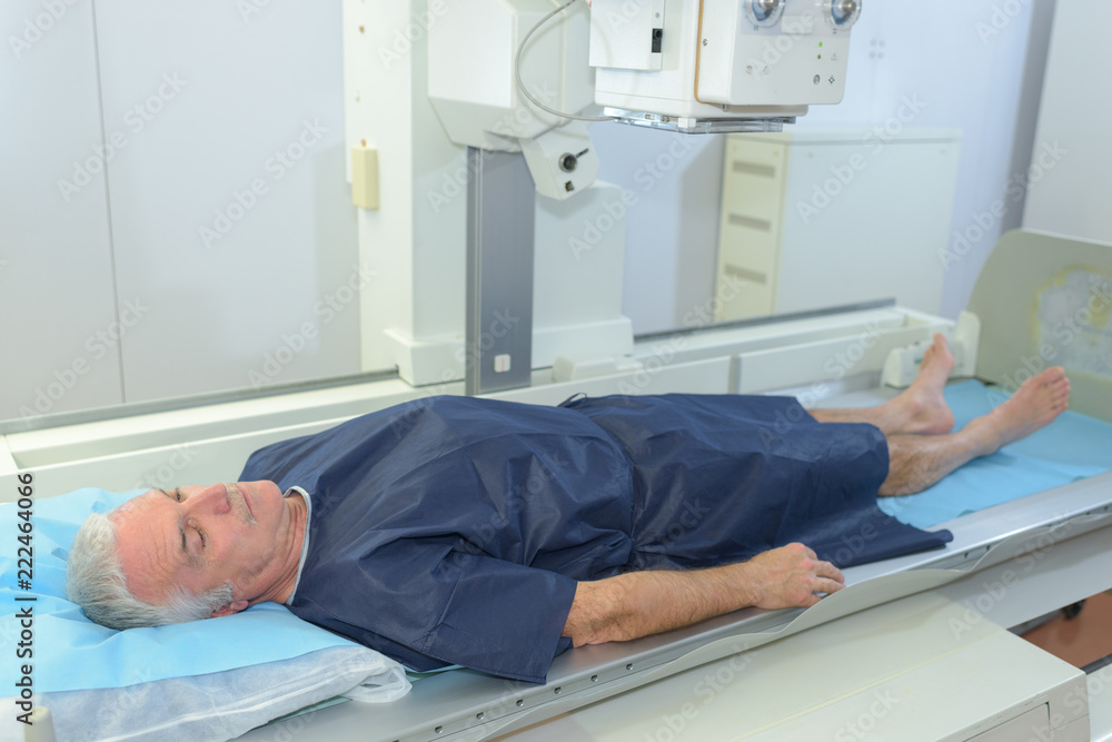 mature patient laying on a hospital mature patient laying on a hospital