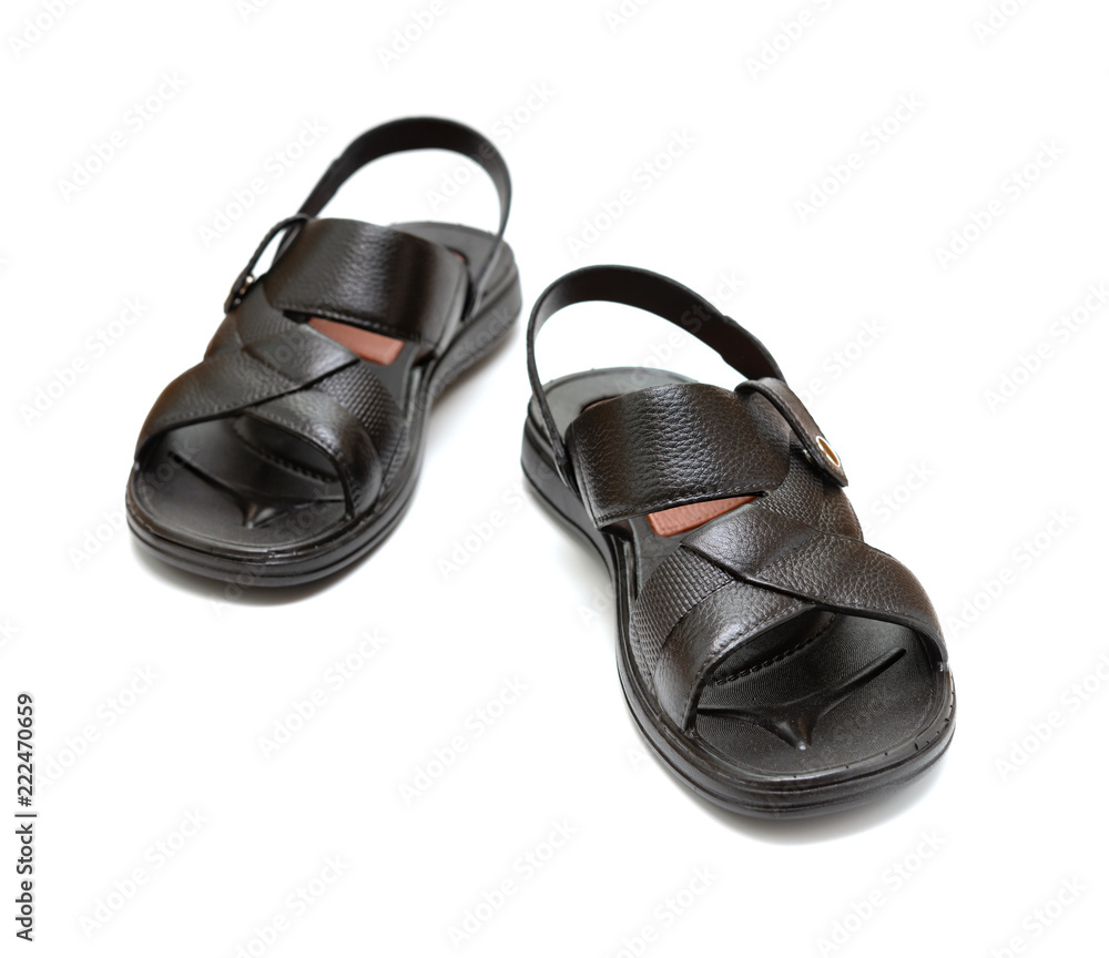 pair of black leisure sandal on white background pair of black leisure sandal on white background