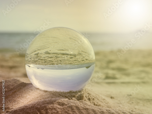 crystal ball ,beach.