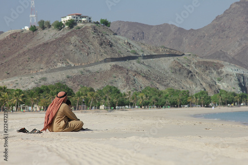 father and son on the beach