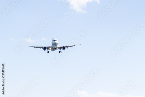 Landing airplane in the sky