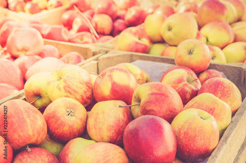 red ripe apples in wooden boxes for sale at street market, retro toned red ripe apples in wooden boxes for sale at street market, retro toned