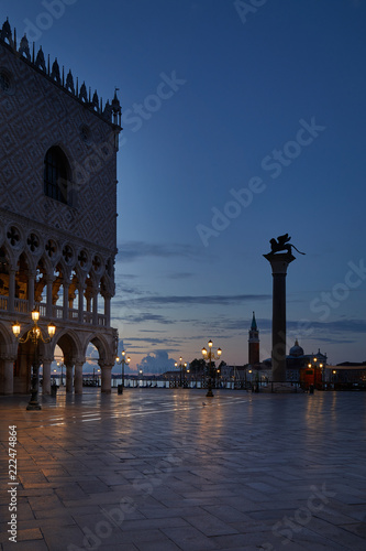San Marco square with winged lion and Doge palace, nobody at the end of the night in Venice, Italy