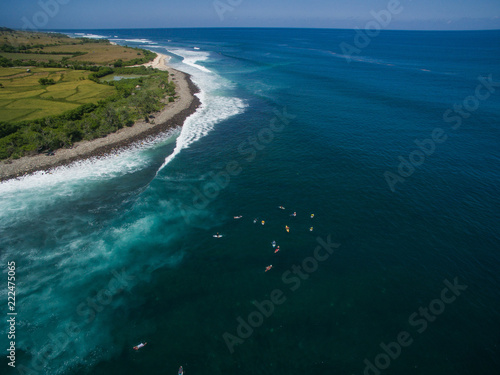 leaky peak perfection left hander cobblestone surfers drone aerial view sumbawa photo